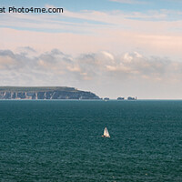 Buy canvas prints of View of the Isle of Wight & The Needles from Highcliffe Beach by Sue Knight