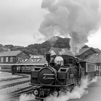 Buy canvas prints of Steam train at Porthmadog station by Sue Knight
