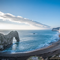 Buy canvas prints of A view of Durdle Door and the beach below  by Sue Knight