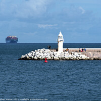 Buy canvas prints of Brixham Breakwater with passing Container Ship by Stephen Hamer