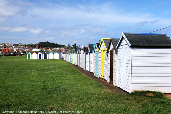 Seaside Charm Beach Huts on the Green Picture Board by Stephen Hamer