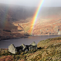 Buy canvas prints of Rainbow Arching over Haweswater, Lake District, Cumbria, UK  by David Forster