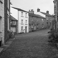Buy canvas prints of  Monochrome Street view in the village of Dent by Richard Long