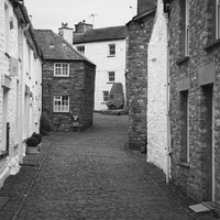 Buy canvas prints of Monochrome view of a street in the village of Dent by Richard Long