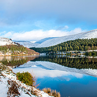 Buy canvas prints of Snowy Winter Reflections at The Derwent Dam, Peak  by Richard Long