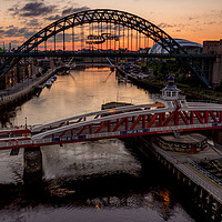 Buy canvas prints of The Tyne bridges at sunrise by Phil Reay
