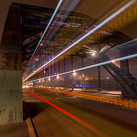 Buy canvas prints of Light trails on the Tyne Bridge by Phil Reay