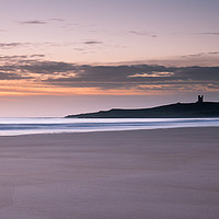 Buy canvas prints of Dunstanburgh Castle at sunrise by Phil Reay