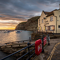 Buy canvas prints of Staithes harbour at sunrise by Phil Reay