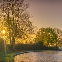 Buy canvas prints of Sunrise over the Narrow boat by John Allsop