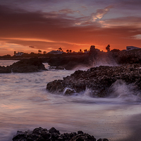 Buy canvas prints of  Sunset on the rocks by David Schofield