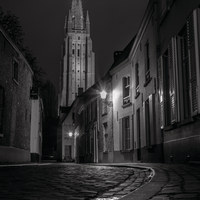 Buy canvas prints of The Church of our Lady, Bruges by David Schofield