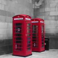 Buy canvas prints of  Two Traditional Red Telephone Boxes by Stuart Giblin