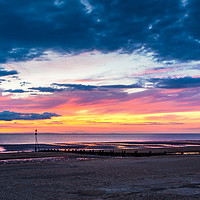 Buy canvas prints of Vivid sunset over Hunstanton beach, Norfolk by Paul Burrows