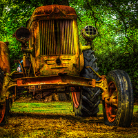Buy canvas prints of Rusty tractor HDR by Gary Schulze