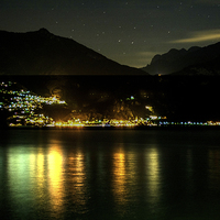 Buy canvas prints of  Lights across the water by Claire Castelli