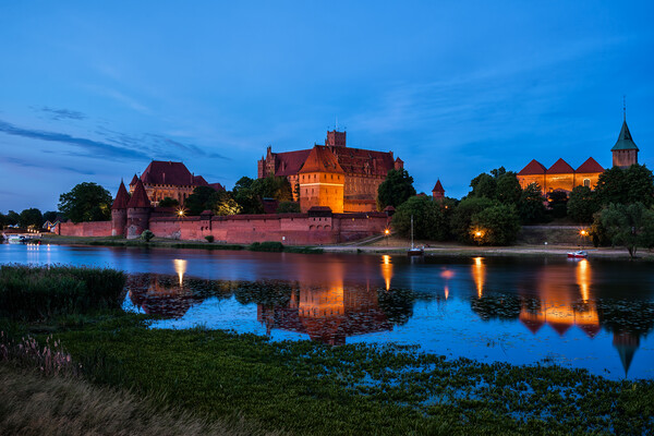 Malbork Castle In Poland Evening River View Picture Board by Artur Bogacki