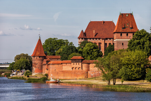 Malbork Castle at Nogat River in Poland Picture Board by Artur Bogacki