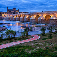 Buy canvas prints of Roman Bridge on Guadalquivir River in Cordoba by Artur Bogacki