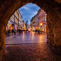 Buy canvas prints of Florianska Gate and Street in Krakow at Dusk by Artur Bogacki
