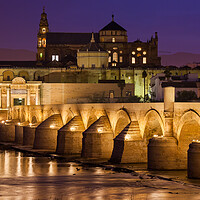 Buy canvas prints of Mosque Cathedral and Roman Bridge in Cordoba by Artur Bogacki