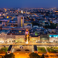 Buy canvas prints of Warsaw Cityscape At Night In Poland by Artur Bogacki
