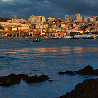 Buy canvas prints of Douro River and Vila Nova de Gaia Skyline At Sunset by Artur Bogacki
