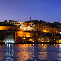 Buy canvas prints of Panorama Of Valletta City In Malta At Night by Artur Bogacki