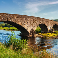 Buy canvas prints of Old Arch Bridge On Suir River In Ireland by Artur Bogacki