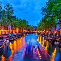 Buy canvas prints of City Lights In Amsterdam Canal At Dusk by Artur Bogacki