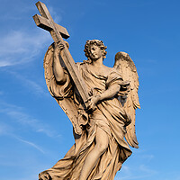 Buy canvas prints of Angel Carrying the Cross Statue by Artur Bogacki