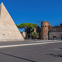 Buy canvas prints of Pyramid of Cestius and San Paolo Gate in Rome by Artur Bogacki