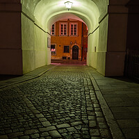 Buy canvas prints of Empty Cobbled Street In City By Night by Artur Bogacki