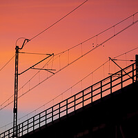 Buy canvas prints of Railway Bridge Electric Traction Sunset Silhouette by Artur Bogacki
