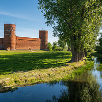 Buy canvas prints of Medieval Castle By The River In Poland by Artur Bogacki