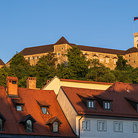 Buy canvas prints of Ljubljana Castle At Sunset In Slovenia by Artur Bogacki