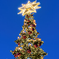 Buy canvas prints of Christmas Tree With Bethlehem Star At Night by Artur Bogacki