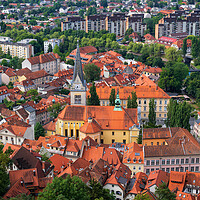 Buy canvas prints of Ljubljana Cityscape With St James Church by Artur Bogacki