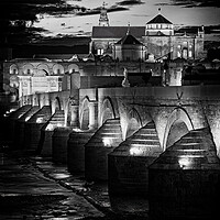 Buy canvas prints of Mezquita And Roman Bridge In Cordoba, Spain by Artur Bogacki