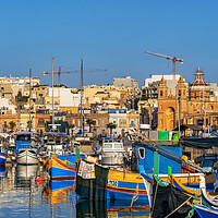 Buy canvas prints of Traditional Luzzu Boats in Marsaxlokk, Malta by Artur Bogacki