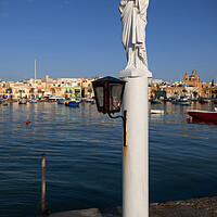 Buy canvas prints of Statue of Jesus at Sea Harbor in Malta by Artur Bogacki