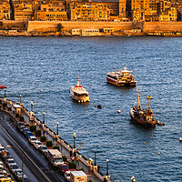 Buy canvas prints of Valletta and Marsamxett Harbour in Malta at Sunset by Artur Bogacki