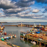 Buy canvas prints of Fishing Harbour In Dunmore East In Ireland by Artur Bogacki