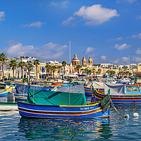 Buy canvas prints of Marsaxlokk Harbor And Skyline In Malta by Artur Bogacki