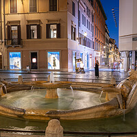 Buy canvas prints of Barcaccia Fountain in Rome at Night by Artur Bogacki