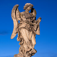 Buy canvas prints of Angel Statue In Rome At Night by Artur Bogacki