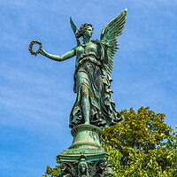 Buy canvas prints of Angel Statue With Laurel Wreath by Artur Bogacki