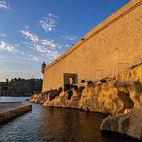 Buy canvas prints of Fort St Angelo Wall at Sunset In Birgu, Malta by Artur Bogacki