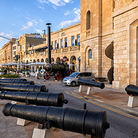 Buy canvas prints of Cannons In Birgu Waterfront In Malta by Artur Bogacki
