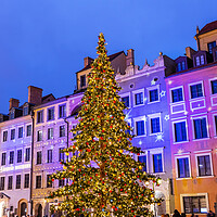 Buy canvas prints of Christmas Tree And Old Town Houses In Warsaw by Artur Bogacki